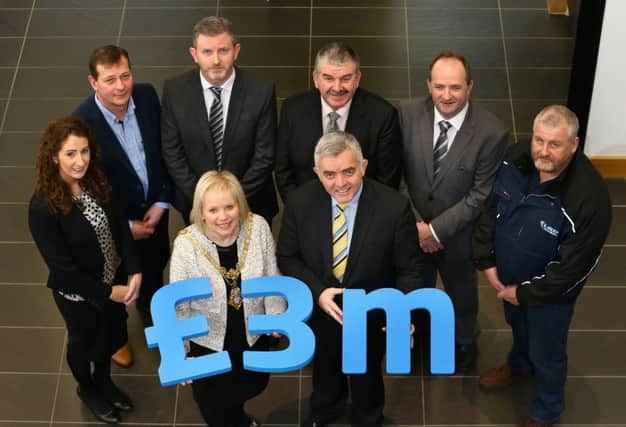 Michelle Knight-McQuillan, Mayor and Enterprise Minister Jonathan Bell, centre,  with from left Karen Fryer, Seating Matters, Michael Devine, Annies Traditional Food, Stephen OHara, RCDS, Philip Smyth, P&L Electricals, Hugh OBoyle, Carnroe Supplies Ltd and Alan Barr, Limavady Roller Doors