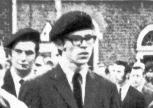 Gerry Adams among the guards of honour at the funeral of an IRA member in January 1973