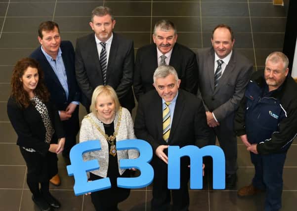 Pictured, (front) Michelle Knight-McQuillan, Mayor and Enterprise Trade & Investment Minister, Jonathan Bell. (Back row left to right) Karen Fryer, Seating Matters, Michael Devine, Annies Traditional Food Ltd, Stephen O'Hara, RCDS, Philip Smyth, P&L Electricals Ltd, Hugh O'Boyle, Carnroe Supplies Ltd and Alan Barr, Limavady Roller Doors Ltd.