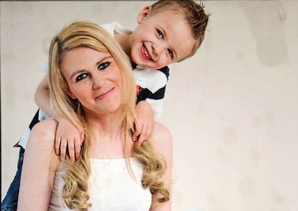 Joshua Kelly pictured with his mum Clare Kelly