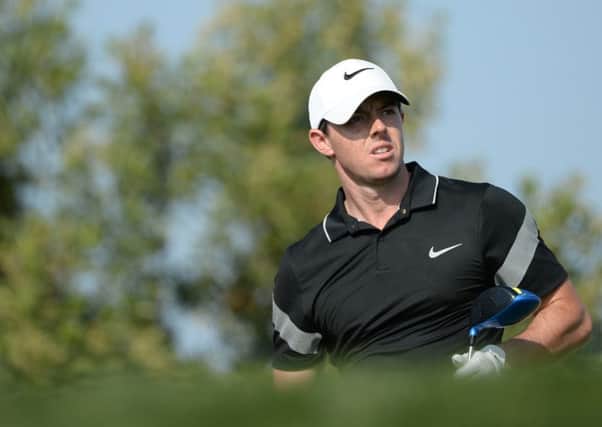 Rory McIlroy looks at the ball after the tee off at the second hole during the second round of the Abu Dhabi Championship.