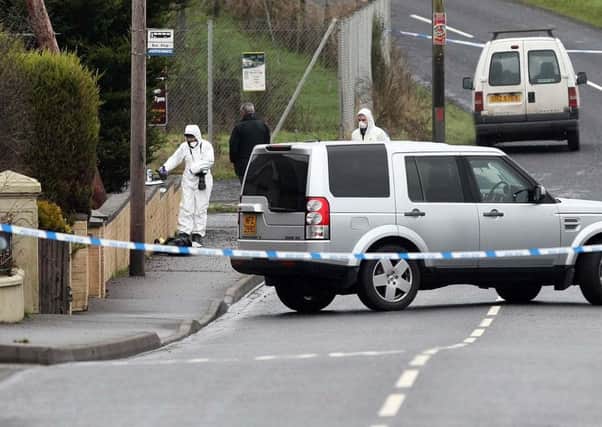 Forensic officers on the scene in Co Tyrone.