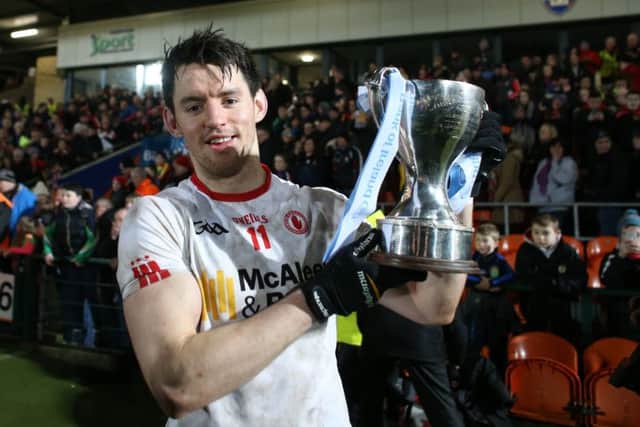 Mattie Donnelly of Tyrone lifts the McKenna Cup