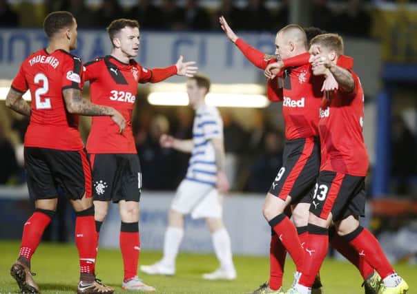 Rangers Kenny Miller (second right) celebrates scoring his sides first goal against Morton