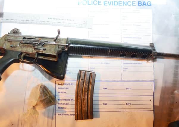 The Armalite-style weapon was found in Strabane on Friday