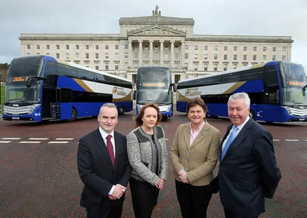 Translink Group chief executive Chris Conway, Minister for Regional Development Michelle McIlveen MLA, First Minister Arlene Foster and Frank Hewitt, Translink chairman, at Stormont with three of the new buses