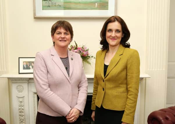 First Minister Arlene Foster (left) pictured with Secretary of State for Northern Ireland Theresa Villiers. 

Picture: Kelvin Boyes / Press Eye.