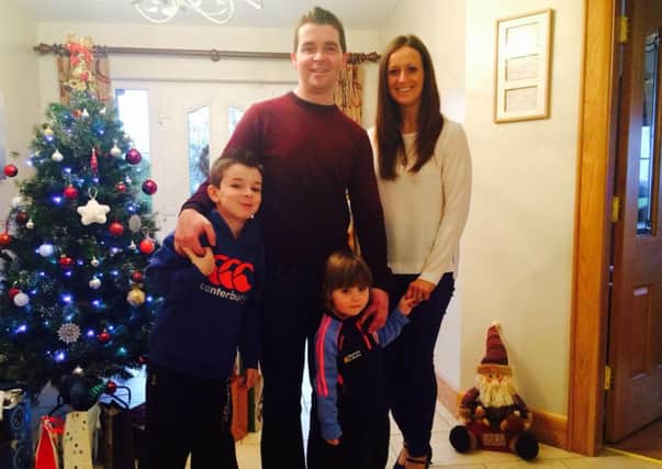 Karen McNally with husband Stephen and their children, eight-year-old Luke and three-year-old Isla.