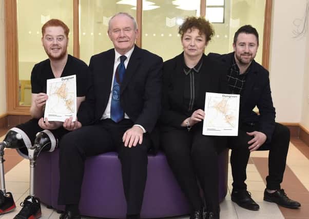 Sports Minister CarÃ¡l Ni Chuilin and Deputy First Minister Martin McGuinness in Dungiven on Wednesday with disabled athlete Ryan O'Connor (left) and Dungiven boxer Paul McCloskey