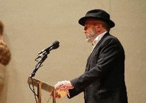 George Galloway speaking at the Ulster Hall event in August 2014