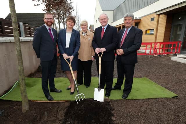 Health Minister Simon Hamilton, First Minister Arlene Foster, Heather Weir, Chief Executive NI Hospice, Deputy First Minister Martin McGuinness and Billy Webb, Chair NI Hospice, at the site of the new adult hospice at Somerton Road, Belfast