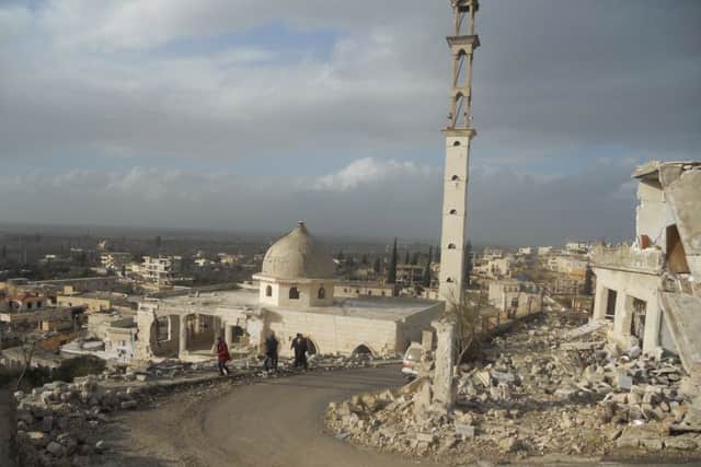 This mosque in a town in northern Idlib is among many buildings destroyed by aerial bombing