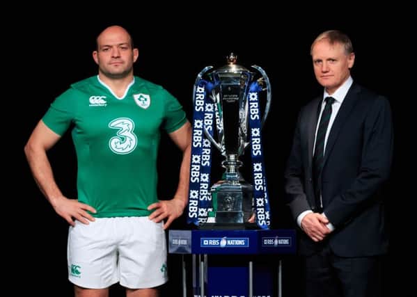 Ireland captain Rory Best (left) and head coach Joe Schmidt pose with the Six Nations trophy