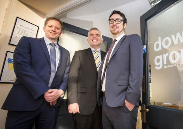 Minister are (L-R) James Dowds, Managing Director and David Porter, Commercial Director Dowds Group.