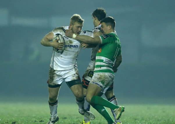 Ulster's Stuart Olding tackled by Tommaso Iannone.