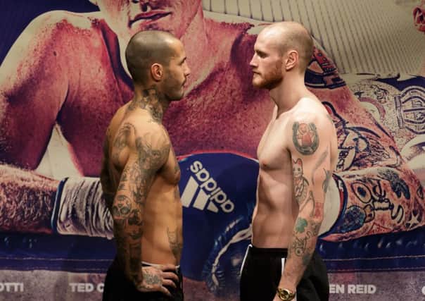 George Groves (right) and Andrea Di Luisa during the Weigh In at Stratford Circus
