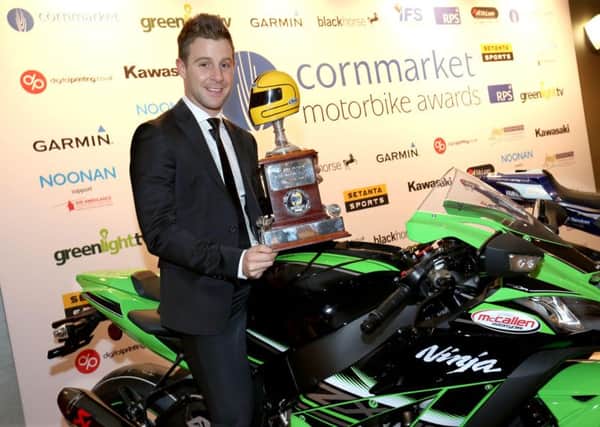 Irish Motorcyclist of the Year winner Jonathan Rea celebrates with the Joey Dunlop Trophy