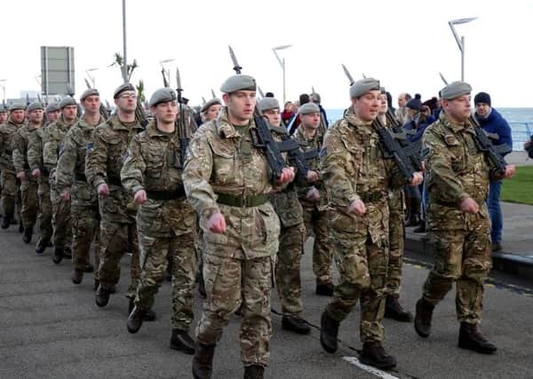 Members of the regiment parading through Carrickfergus today.