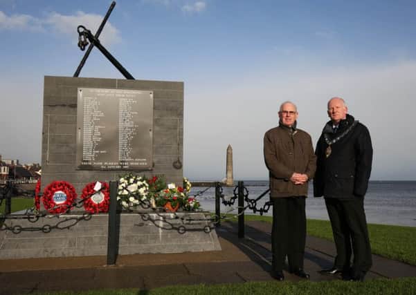 The Mayor of Mid and East Antrim Borough, Councillor Billy Ashe is pictured at the Princess Victoria Memorial in Larne with William McAllister who is the only living survivor of the of disaster, when he was 17 he was a galley boy on the ship