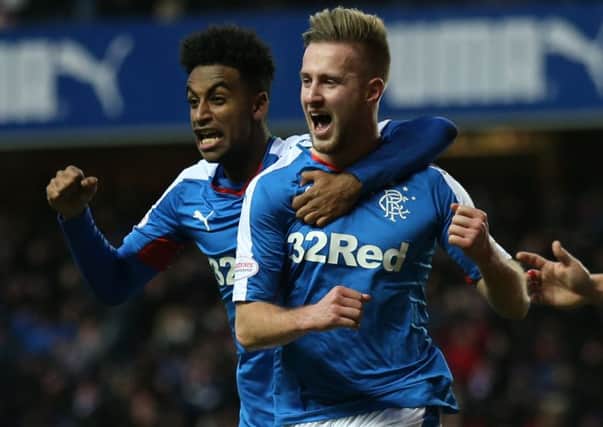 Rangers' Billy King (right) celebrates scoring his side's first goal