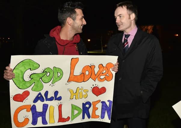 Simon Calvert from the Christian Institute (right) pictured with protestor Daniel May at Craigavon civic centre. Photograph: Presseye /Stephen Hamilton