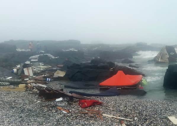 Undated handout photo issued by the National Sea Rescue Institute South Africa of the scene where a Yacht ran into trouble and was found crashed into rocks on the western coast of South Africa