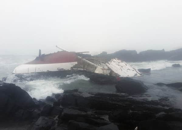A Yacht which ran into trouble and was found crashed into rocks on the western coast of South Africa. A Scottish man and an Irish woman have died.  Photo: NSRI/PA Wire