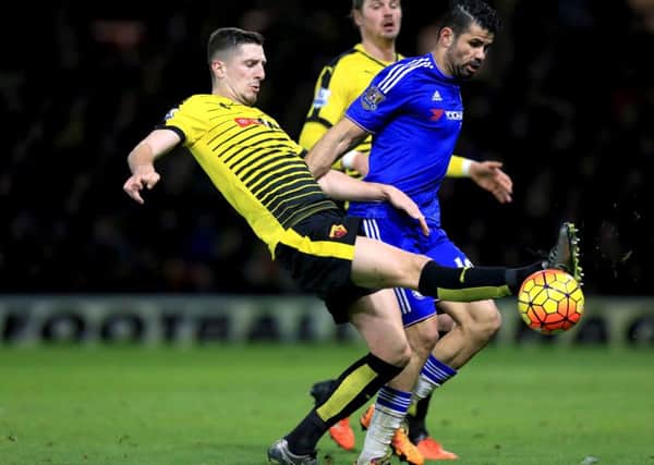 Chelsea's Diego Costa in action with Watford's Craig Cathcart