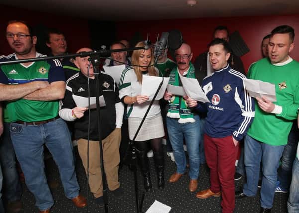 UTV's Ruth Gorman, News Letter columnist Liam Beckett and Cool FM Pete Snodden along with members of the 'Oui Norn Iron' group record a charity record 'On Our Way to France' for the Euro 2016 Tournament in aid of the Tiny Life charity. 
Picture by Brian Little/Presseye