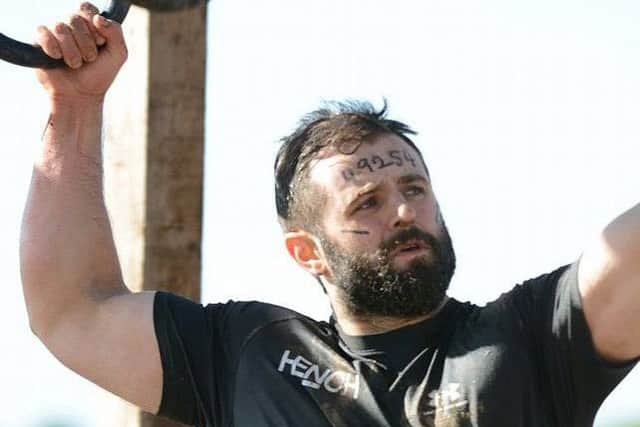 Rory Girvan competing in the Tough Mudder event