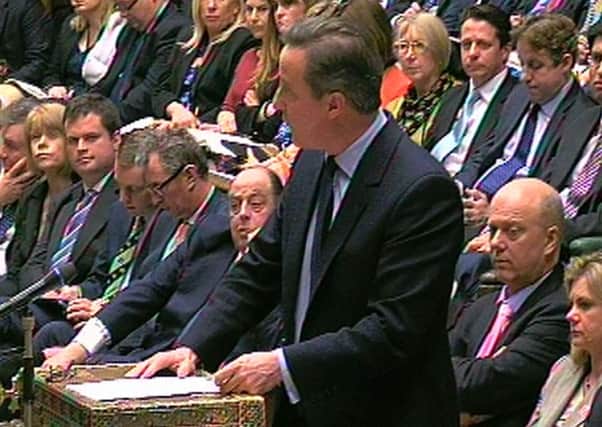 Prime Minister David Cameron facing questions from DUP MPs, among others, in Parliament on Wednesday