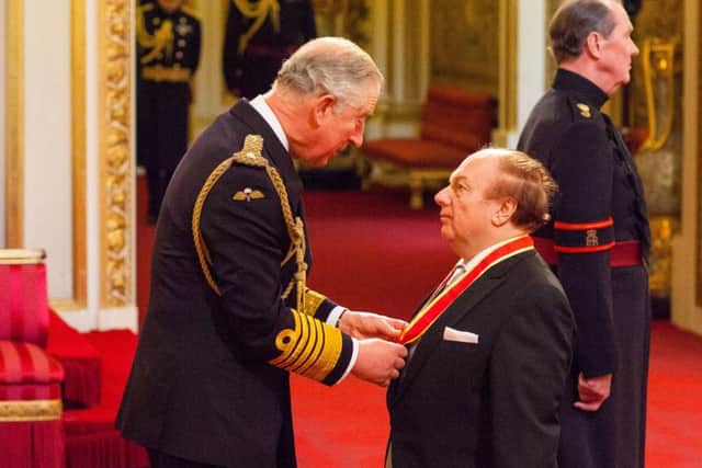 Sir Ivan Morrison is made a Knight Bachelor of the British Empire by the Prince of Wales during an Investiture ceremony at Buckingham Palace, London