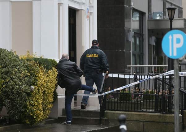 Gardai outside the Regency Hotel in Dublin after one man died and two others were injured following a shooting incident at the hotel.  Photo. Niall Carson/PA Wire