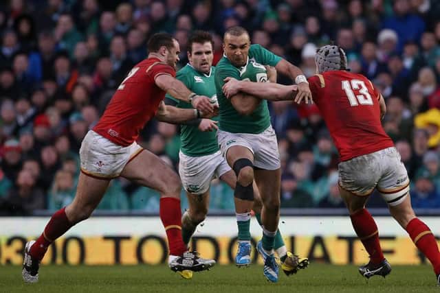 Ireland's Simon Zebo tackled by   Wales Jamie Roberts and  Jonathan Davies during Sunday's RBS 6 Nations match  at Aviva Stadium, Dublin.  Picture by Brian Little