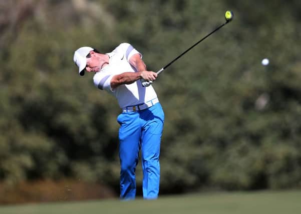 Rory McIlroy plays a shot on the 3rd hole  during 3rd round of the Dubai Desert Classic