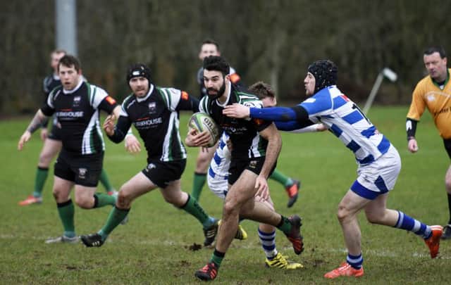 Neil Brown powers forward for City of Derry during Saturday's defeat to Dungannon. DER0616-102KM