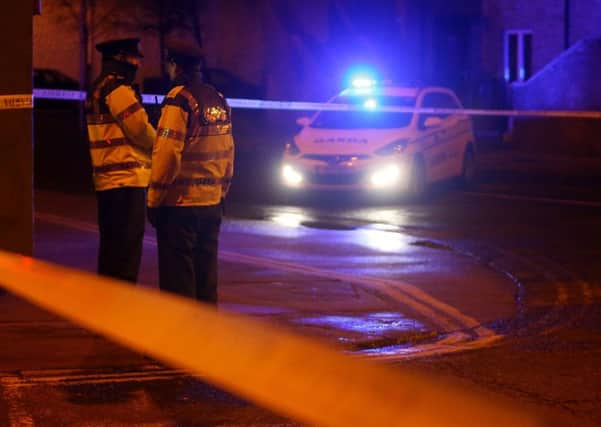 Garda officers attend the scene on Poplar Row, North Strand following the shooting of a second man in Dublin, in an apparent gangland feud