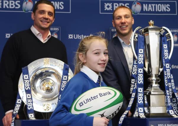 Amelia Thompson from Bocombra Primary School with Ulster Bank rugby ambassadors Stephen Ferris and Alan Quinlan