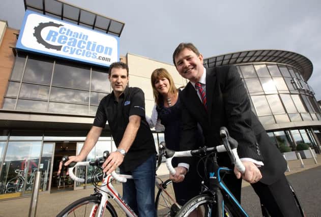 Chris Watson outside Chain Reaction's Belfast store as the firm looks forward to an "exctiting new chapter"
