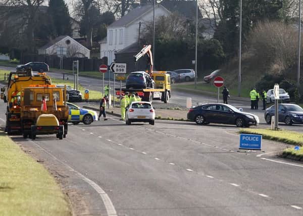 Police at the scene of the fatal crash on the A26 Pic Steven McAuley/McAuley Multimedia
