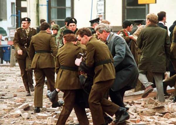 The scene of the Enniskillen bomb seconds after the blast