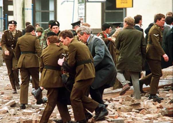 The scene of the Enniskillen bomb seconds after the blast.