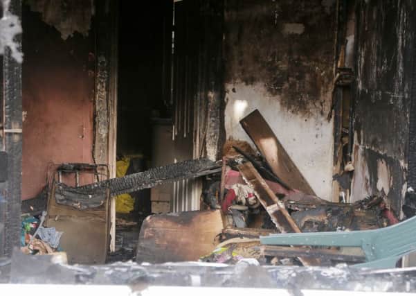 Pictured is the scene of a deliberate fire in the Glencairn Crescent area of Belfast