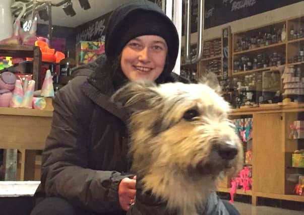 Lottie and her dog Marley outside Lush in Oxford, the homeless woman and her dog "courageously" confronted a thief and were able to return goods worth over Â£1,000 stolen from the beauty store. PRESS ASSOCIATION Photo.