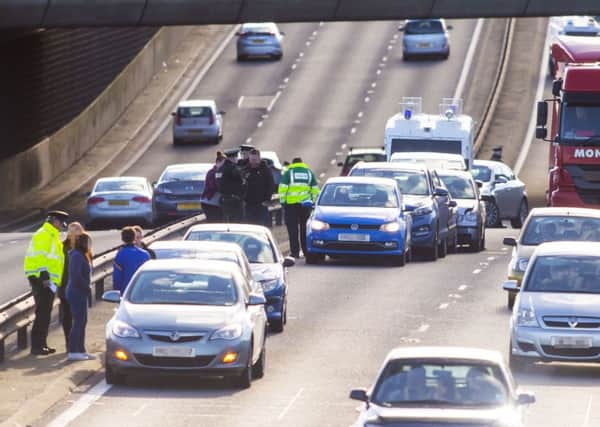 The scene of Multiple Car Collision that close the outside lane of the M1 City Bound at the Divus St off slip on February 14