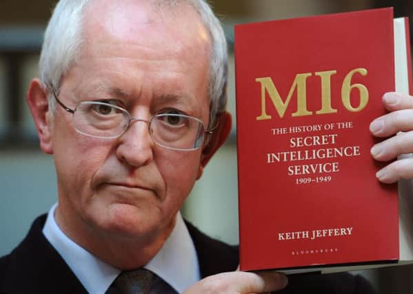 Professor Keith Jeffrey with his book that chronicled the first 40 years of MI6