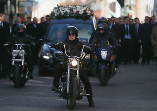Motorcyclists lead the cortege for the funeral of David Byrne in Dublin