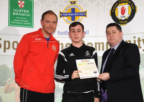 Andrew Woodside from Larne Youth FC was presented with a GoldMark certificate by Gerard Lawlor from the Irish FA Football Committee and Ross Redman of the Irish FA.