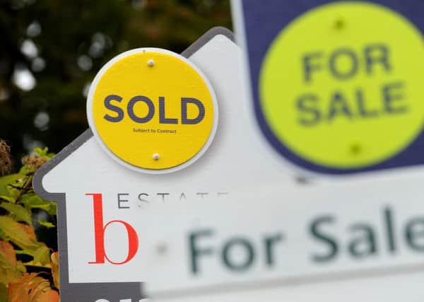 Sold and For Sale signs as house sellers' asking prices jumped to a record high of nearly Â£300,000 on average in February, a property website has reported