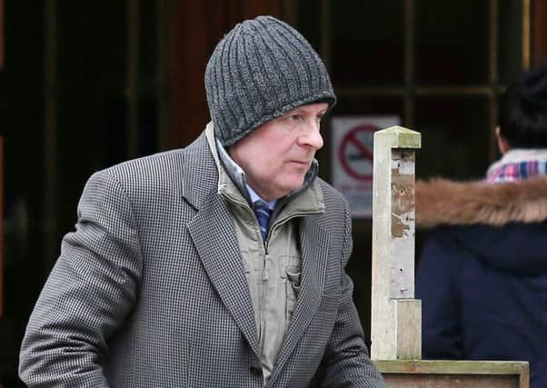 Maurice Weir leaves Belfast High Court after he was awarded Â£60,000 in damages